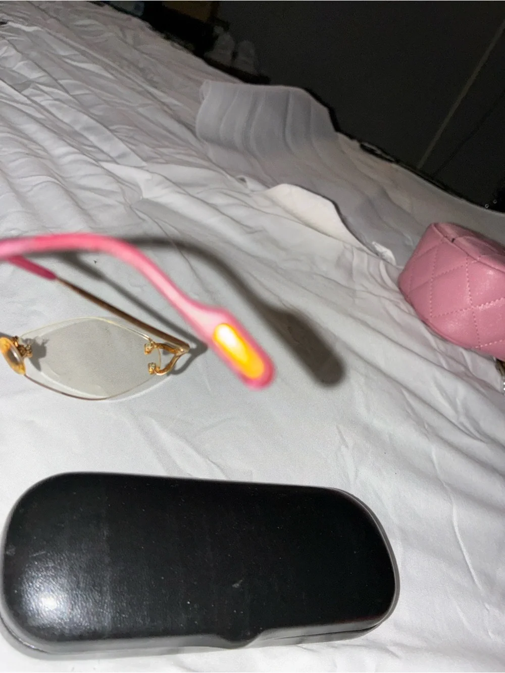 Cartier Gold Rimless Women's Glasses with Subtle Pink Temples